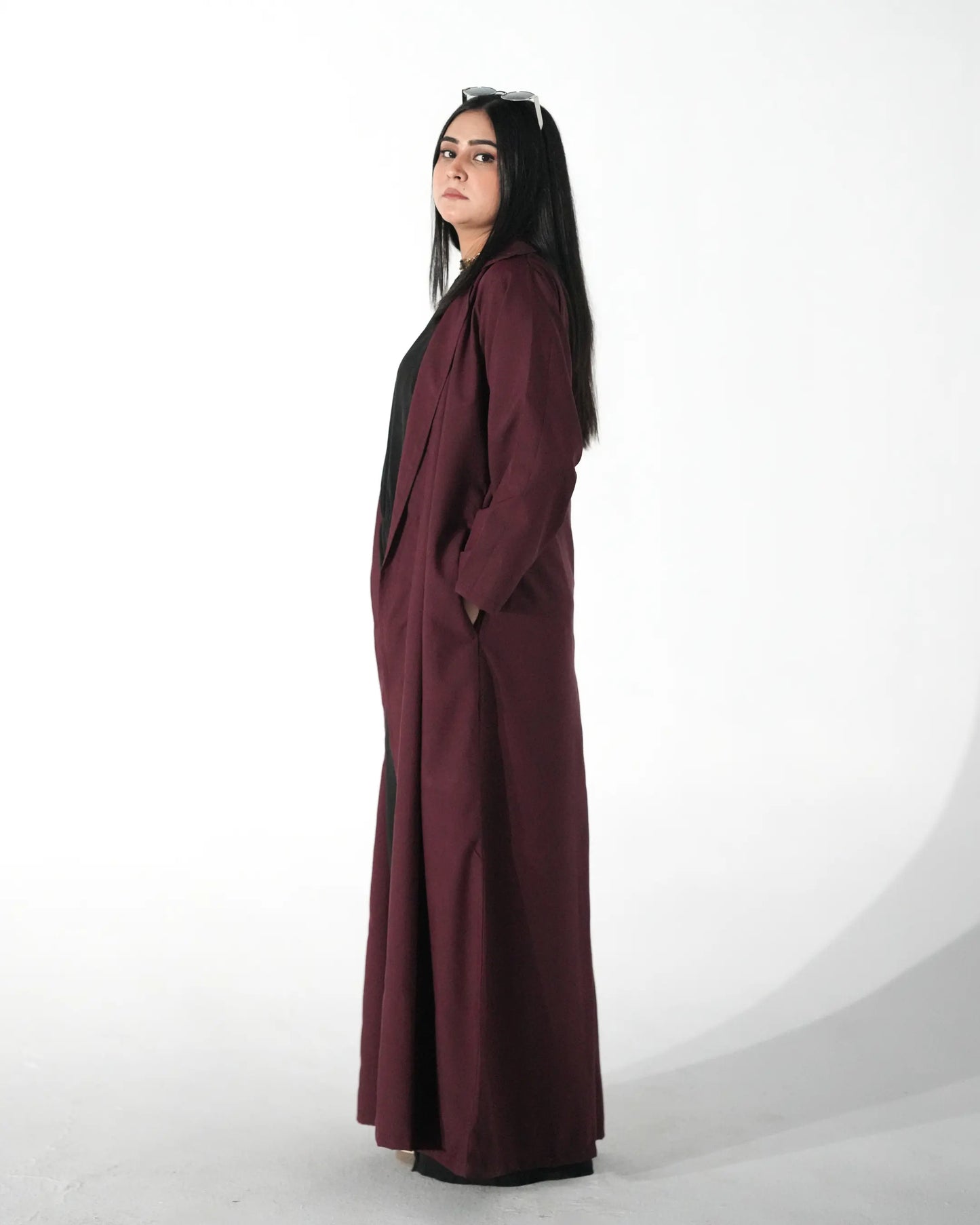 Maroon open front abaya showing movement and relaxed fall